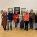 Angela Reed, left, with some of the members of her groups at the launch of the Inspired by Lindisfarne exhibition at The Customs House.