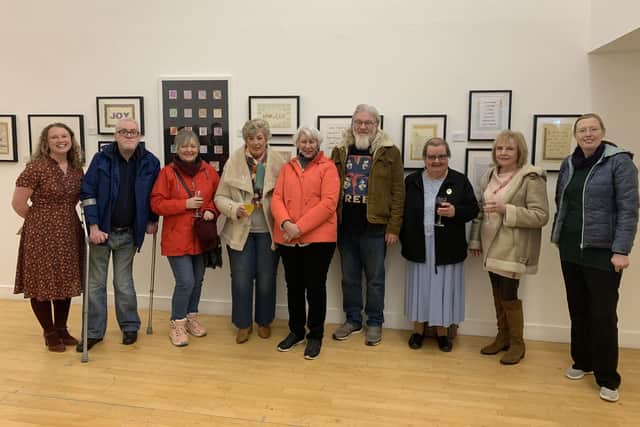 Angela Reed, left, with some of the members of her groups at the launch of the Inspired by Lindisfarne exhibition at The Customs House.