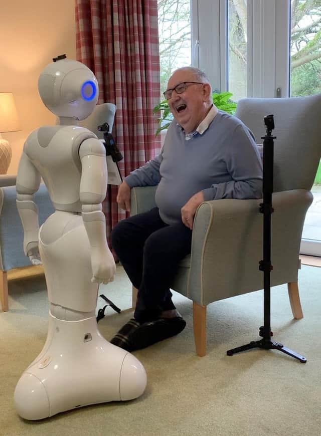 Robots could be introduced to help care for the elderly after a study showed they can improve mental health and have the potential to reduce loneliness in older people.
