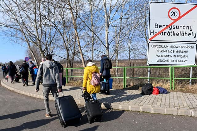 Ukrainians have left their homes in order to find safety across Europe. Photo: Attila Kisbenedek/Getty Images.