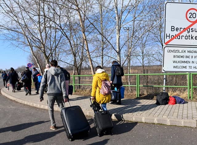 Ukrainians have left their homes in order to find safety across Europe. Photo: Attila Kisbenedek/Getty Images.