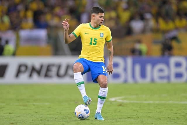 Bruno Guimaraes will represent Brazil in Qatar (Photo by DOUGLAS MAGNO/AFP via Getty Images)
