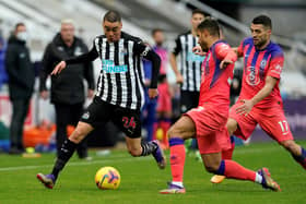 Newcastle United's Paraguayan midfielder Miguel Almiron (L) vies with Chelsea's Brazilian-Italian defender Emerson Palmieri during the English Premier League football match between Newcastle United and Chelsea at St James' Park in Newcastle-upon-Tyne, north east England on November 21, 2020. (Photo by Owen Humphreys / POOL / AFP) / RESTRICTED TO EDITORIAL USE. No use with unauthorized audio, video, data, fixture lists, club/league logos or 'live' services. Online in-match use limited to 120 images. An additional 40 images may be used in extra time. No video emulation. Social media in-match use limited to 120 images. An additional 40 images may be used in extra time. No use in betting publications, games or single club/league/player publications. /  (Photo by OWEN HUMPHREYS/POOL/AFP via Getty Images)