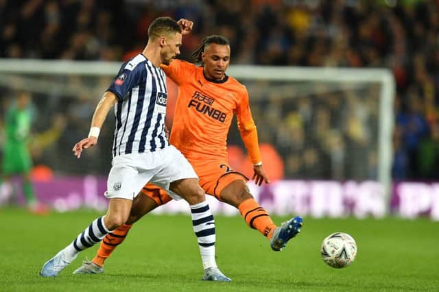West Bromwich Albion's English defender Kieran Gibbs (L) vies with Newcastle United's Austrian midfielder Valentino Lazaro during the English FA Cup fifth round football match between West Bromwich Albion and Newcastle United at The Hawthorns stadium in West Bromwich, central England, on March 3, 2020.