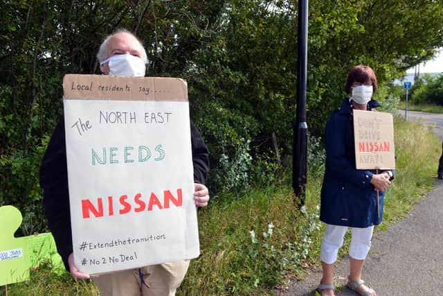 The group made signs so passers-by could see what they are fighting for.