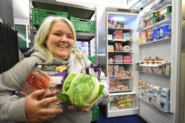 Tracy Beaton, who runs Bede's Helping Hands, with the community fridge which is now ready to help locals struggling with their food needs.