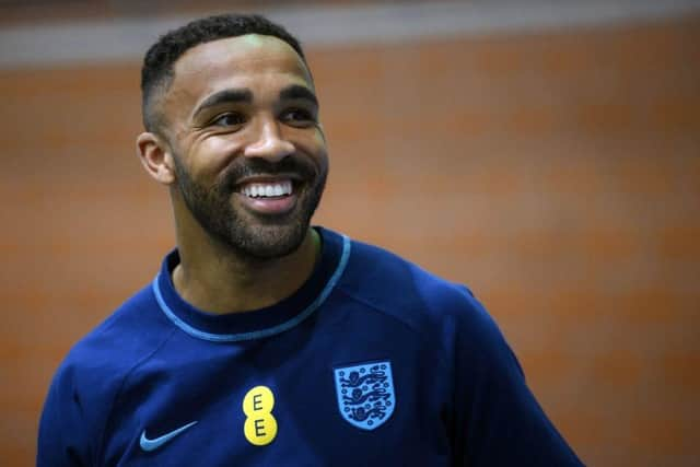 England's forward #24 Callum Wilson takes part in a darts competition against a journalist at Al Wakrah SC Stadium in Al Wakrah, south of Doha on December 8, 2022 during the Qatar 2022 World Cup football tournament. (Photo by Paul ELLIS / AFP) (Photo by PAUL ELLIS/AFP via Getty Images)