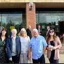 Toni Potts (far left) and John Baker (second from left) along with other family members outside of the Stadium of Light.