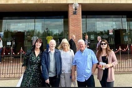 Toni Potts (far left) and John Baker (second from left) along with other family members outside of the Stadium of Light.