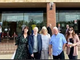 Toni Potts (far left) and John Baker (second from left) along with other family members outside of the Stadium of Light.