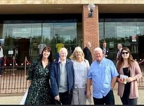 Toni Potts (far left) and John Baker (second from left) along with other family members outside of the Stadium of Light.