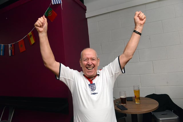 A fan in jubilant mood following England's 3-0 victory.