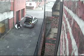 The occupant of the car leaves the washing machine in the South Shields back lane.