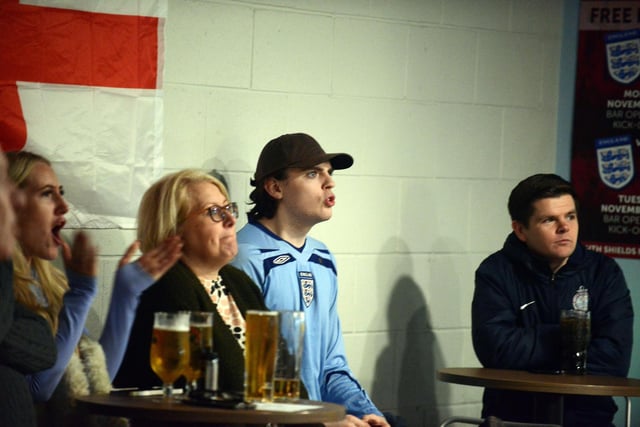 Supporters intently watching the action unfold between England and Wales.