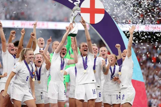 Ellen White and Jill Scott lift the trophy after winning the UEFA Women's Euro 2022 final match. Picture: Naomi Baker/Getty Images.