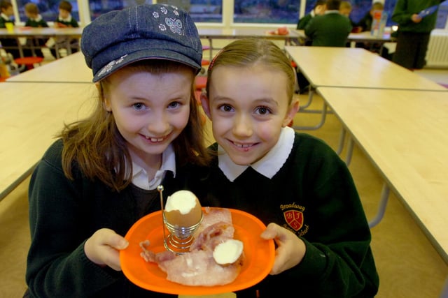 Abby Craig, 7, and Mischa Steele, 8, are pictured with breakfast at Broadway Junior School in 2010.