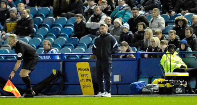 Lee Johnson watches on at Sheffield Wednesday