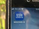 The NHS Covid-19 app on a mobile phone. Picture Scott D'Arcy/PA Wire