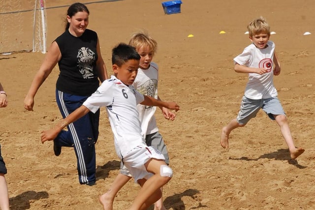 Game of football anyone? These youngsters were having a great time at Sandhaven 14 years ago.