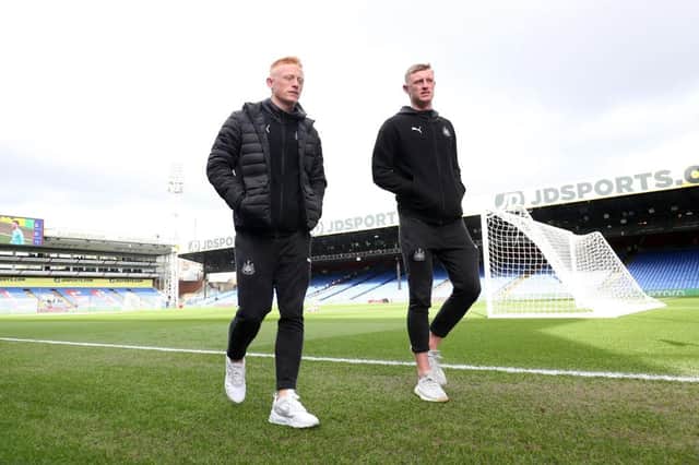 LONDON, ENGLAND - FEBRUARY 22: Matthew Longstaff of Newcastle United (left) and Sean Longstaff of Newcastle United check out the pitch prior to the Premier League match between Crystal Palace and Newcastle United at Selhurst Park on February 22, 2020 in London, United Kingdom. (Photo by Alex Morton/Getty Images )