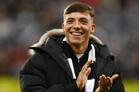 Newcastle United signing Harrison Ashby applauds the fans as he is presented prior to the Carabao Cup Semi Final 2nd Leg match between Newcastle United and Southampton at St James' Park on January 31, 2023 in Newcastle upon Tyne, England. (Photo by Gareth Copley/Getty Images)