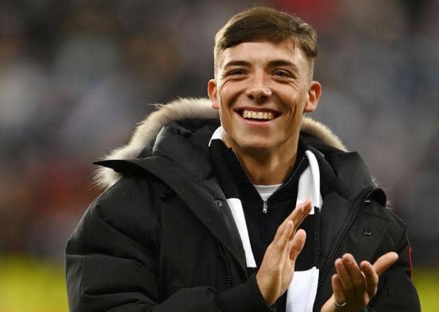 Newcastle United signing Harrison Ashby applauds the fans as he is presented prior to the Carabao Cup Semi Final 2nd Leg match between Newcastle United and Southampton at St James' Park on January 31, 2023 in Newcastle upon Tyne, England. (Photo by Gareth Copley/Getty Images)
