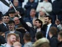 Yasir Al-Rumayyan, Chairman of Newcastle United waves a flag prior to the Premier League match between Newcastle United and Crystal Palace at St. James Park on April 20, 2022 in Newcastle upon Tyne, England. (Photo by Ian MacNicol/Getty Images)