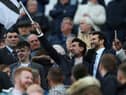 Yasir Al-Rumayyan, Chairman of Newcastle United waves a flag prior to the Premier League match between Newcastle United and Crystal Palace at St. James Park on April 20, 2022 in Newcastle upon Tyne, England. (Photo by Ian MacNicol/Getty Images)