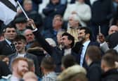 Yasir Al-Rumayyan, Chairman of Newcastle United waves a flag prior to the Premier League match between Newcastle United and Crystal Palace at St. James Park on April 20, 2022 in Newcastle upon Tyne, England. (Photo by Ian MacNicol/Getty Images)