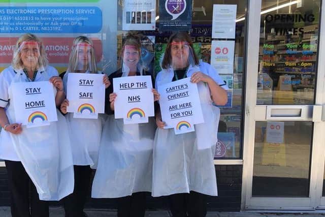 Staff from the pharmacy show their support for the NHS during the pandemic as they too work to support the vulnerable.