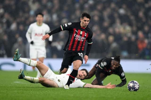 LONDON, ENGLAND - MARCH 08: Brahim Diaz of AC Milan runs with the ball after evading Ben Davies of Tottenham Hotspur during the UEFA Champions League round of 16 leg two match between Tottenham Hotspur and AC Milan at Tottenham Hotspur Stadium on March 08, 2023 in London, England. (Photo by Justin Setterfield/Getty Images)