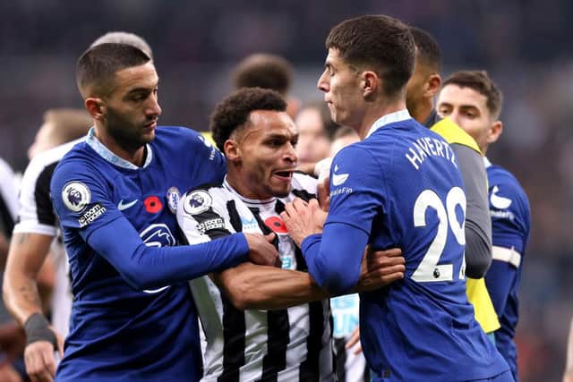 Jacob Murphy of Newcastle United clashes with Kai Havertz of Chelsea during the Premier League match between Newcastle United and Chelsea FC at St. James Park on November 12, 2022 in Newcastle upon Tyne, England. (Photo by George Wood/Getty Images)