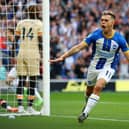 BRIGHTON, ENGLAND - OCTOBER 29: Leandro Trossard of Brighton & Hove Albion celebrates after scoring their team's first goal during the Premier League match between Brighton & Hove Albion and Chelsea FC at American Express Community Stadium on October 29, 2022 in Brighton, England. (Photo by Bryn Lennon/Getty Images)