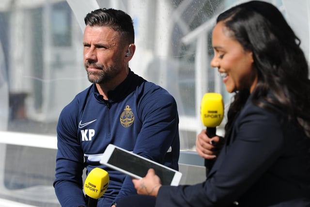 Kevin Phillips gets ready for his interview as Alex Scott goes through her script