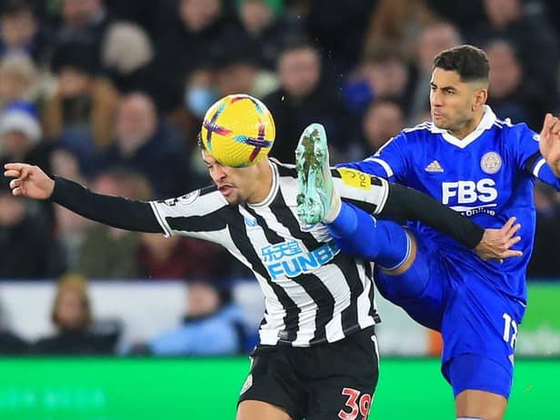 Newcastle United's Brazilian midfielder Bruno Guimaraes (L) vies with Leicester City's Spanish striker Ayoze Perez (R) during the English Premier League football match between Leicester City and Newcastle United at King Power Stadium in Leicester, central England on December 26, 2022 (Photo by LINDSEY PARNABY/AFP via Getty Images)
