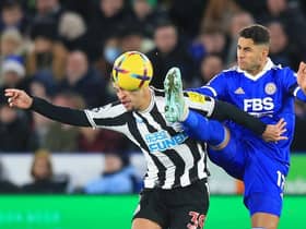 Newcastle United's Brazilian midfielder Bruno Guimaraes (L) vies with Leicester City's Spanish striker Ayoze Perez (R) during the English Premier League football match between Leicester City and Newcastle United at King Power Stadium in Leicester, central England on December 26, 2022 (Photo by LINDSEY PARNABY/AFP via Getty Images)