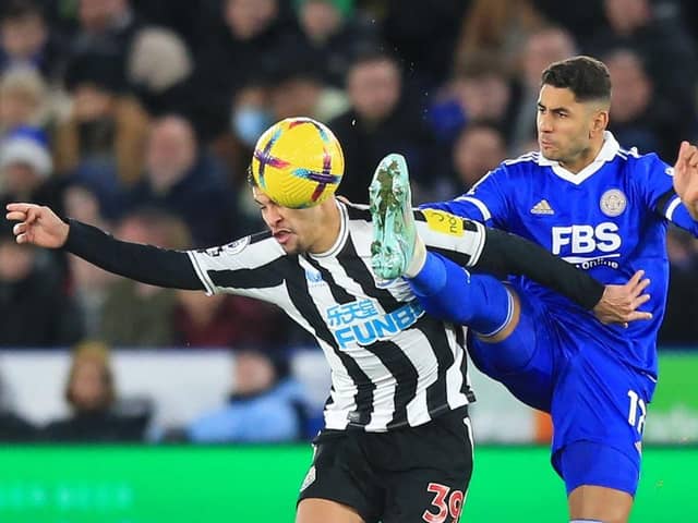 Newcastle United's Brazilian midfielder Bruno Guimaraes (L) vies with Leicester City's Spanish striker Ayoze Perez (R) during the English Premier League football match between Leicester City and Newcastle United at King Power Stadium in Leicester, central England on December 26, 2022 (Photo by LINDSEY PARNABY/AFP via Getty Images)