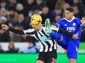 Newcastle United's Brazilian midfielder Bruno Guimaraes (L) vies with Leicester City's Spanish striker Ayoze Perez (R) during the English Premier League football match between Leicester City and Newcastle United at King Power Stadium in Leicester, central England on December 26, 2022 (Photo by LINDSEY PARNABY/AFP via Getty Images)