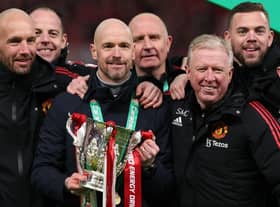 Erik ten Hag (C), Manager of Manchester United, Assistant Managers, Mitchell van der Gaag (L) and Steve McClaren celebrate with the Carabao Cup trophy following victory in the Carabao Cup Final match between Manchester United and Newcastle United at Wembley Stadium on February 26, 2023 in London, England. (Photo by Julian Finney/Getty Images)