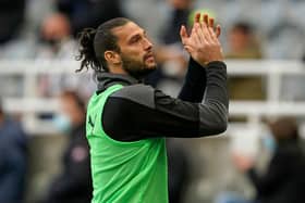 Andy Carroll applauds fans after his last Newcastle United appearance.