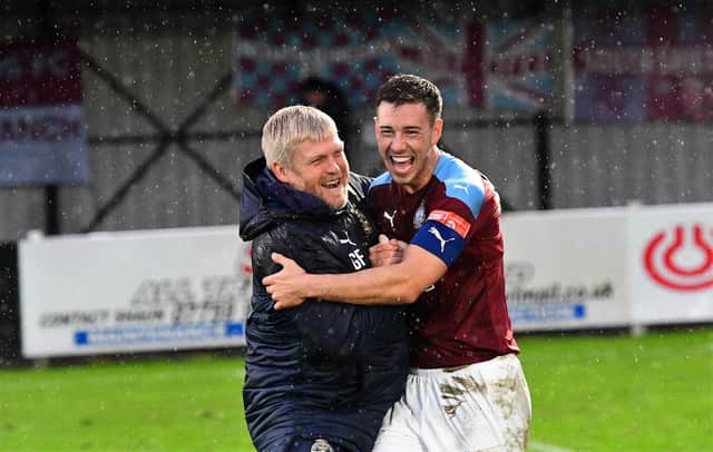 Joint manager Graham Fenton and captain Robert Briggs celebrate South Shields' win over Halifax Town (photo: Kevin Wilson)