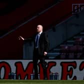 Sean Dyche, manager of Burnley, gives his team instructions during the Premier League match between Southampton and Burnley.
