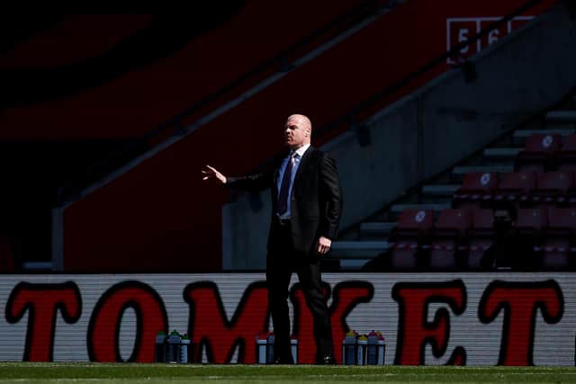 Sean Dyche, manager of Burnley, gives his team instructions during the Premier League match between Southampton and Burnley.