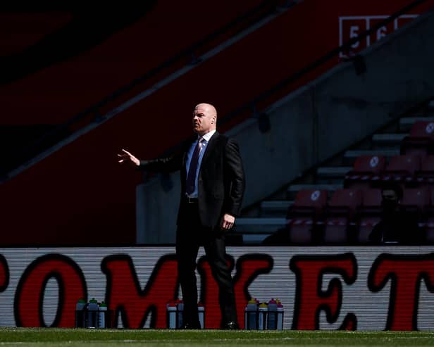 Sean Dyche, manager of Burnley, gives his team instructions during the Premier League match between Southampton and Burnley.