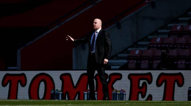 Sean Dyche, manager of Burnley, gives his team instructions during the Premier League match between Southampton and Burnley.