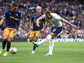 Harry Kane of Spurs shoots at goal during the Premier League match between Tottenham Hotspur and Newcastle United at Tottenham Hotspur Stadium on October 23, 2022 in London, England. (Photo by Julian Finney/Getty Images)