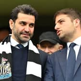 Newcastle United directors Mehrdad Ghodoussi (L) and Jamie Reuben react in the stands ahead of English Premier League football match between Chelsea and Newcastle United at Stamford Bridge in London on March 13, 2022. (Photo by JUSTIN TALLIS/AFP via Getty Images)