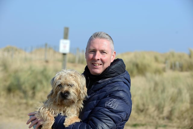 Out and about at Sandhaven Beach. Peter Gulbrandsen with dog Leo.