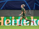 LEIPZIG, GERMANY - SEPTEMBER 06: Mykhaylo Mudryk of Shakhtar Donetsk celebrates after scoring their team's third goal during the UEFA Champions League group F match between RB Leipzig and Shakhtar Donetsk at Red Bull Arena on September 06, 2022 in Leipzig, Germany. (Photo by Cathrin Mueller/Getty Images)