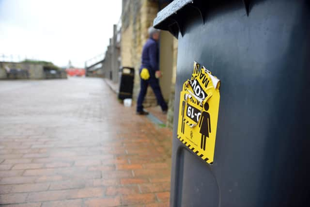 Covid warning signage at Sandhaven, South Shields seafront.